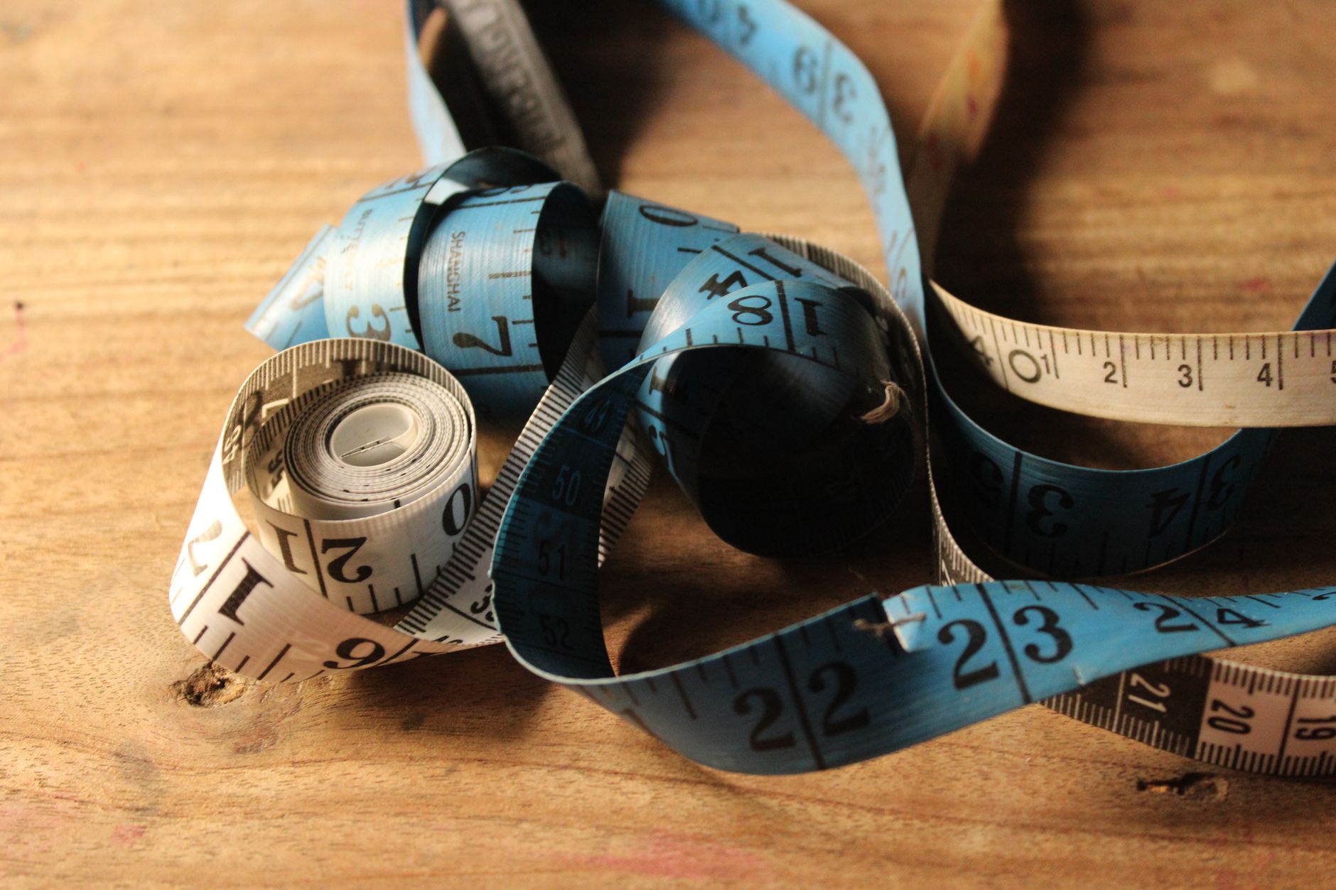 tape measure on soft sided pet carrier at home before trip