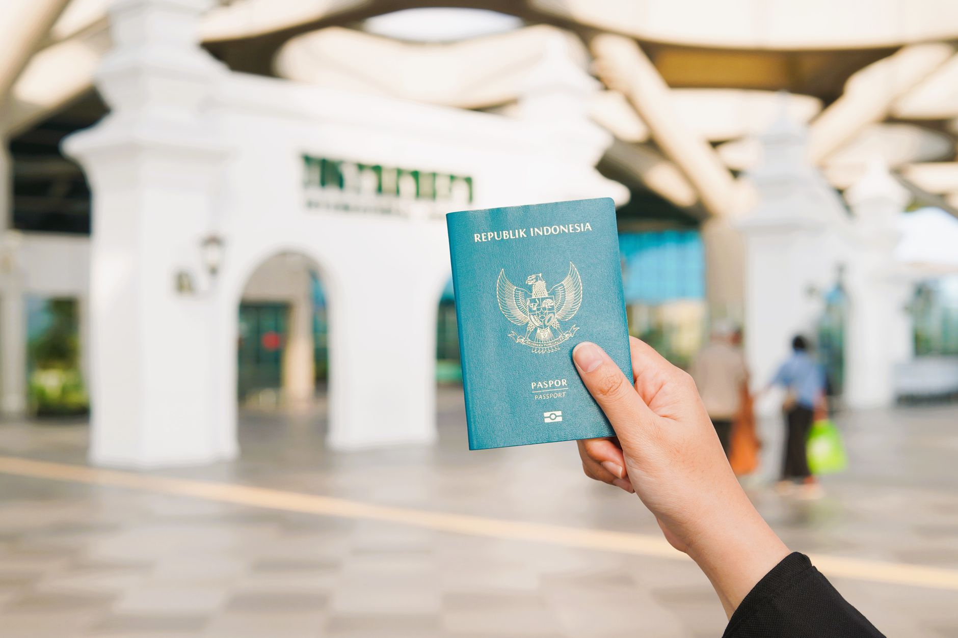 dog owner holding travel documents at ferry terminal