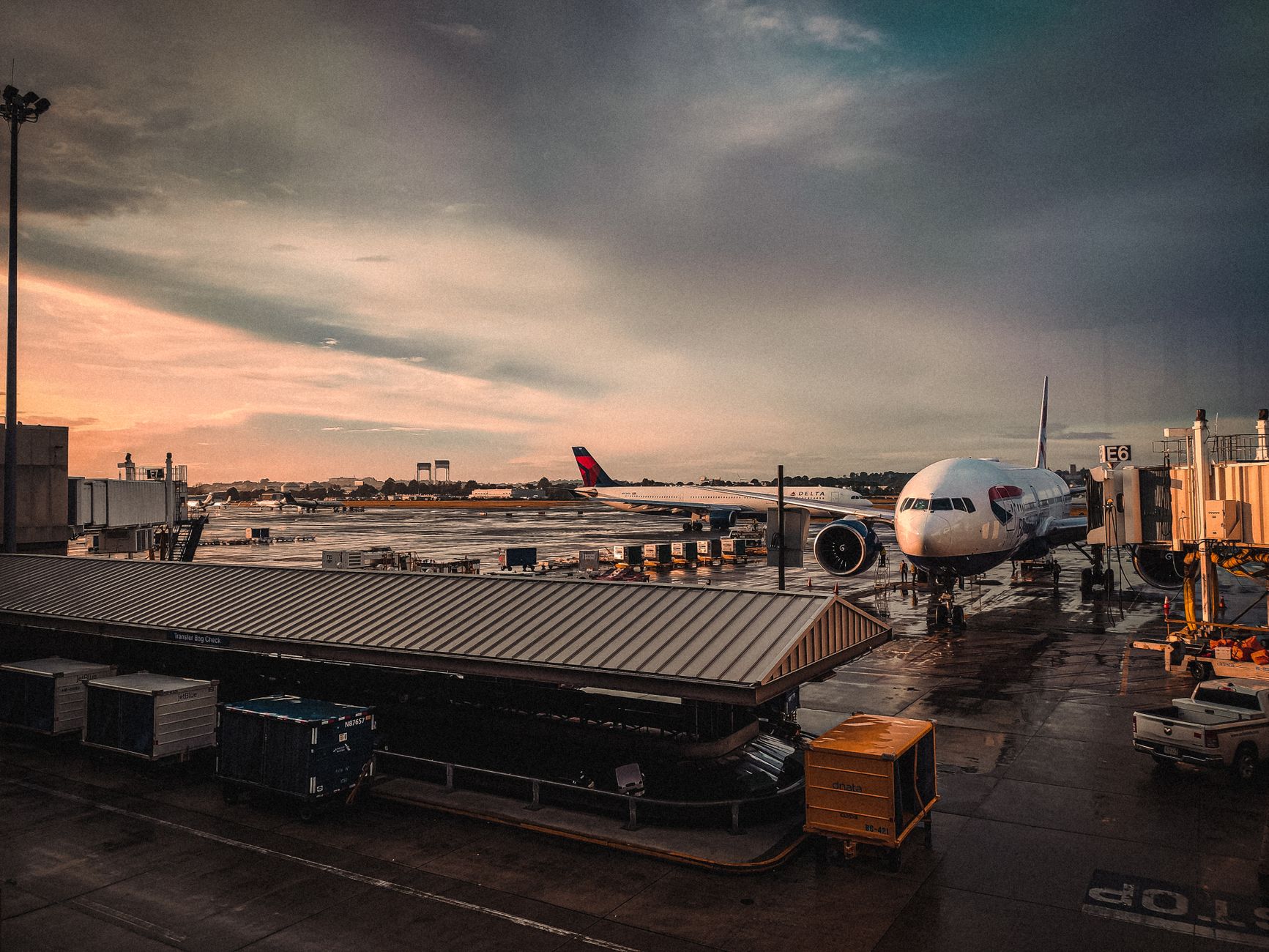 traveler boarding commercial jet with underseat pet backpack