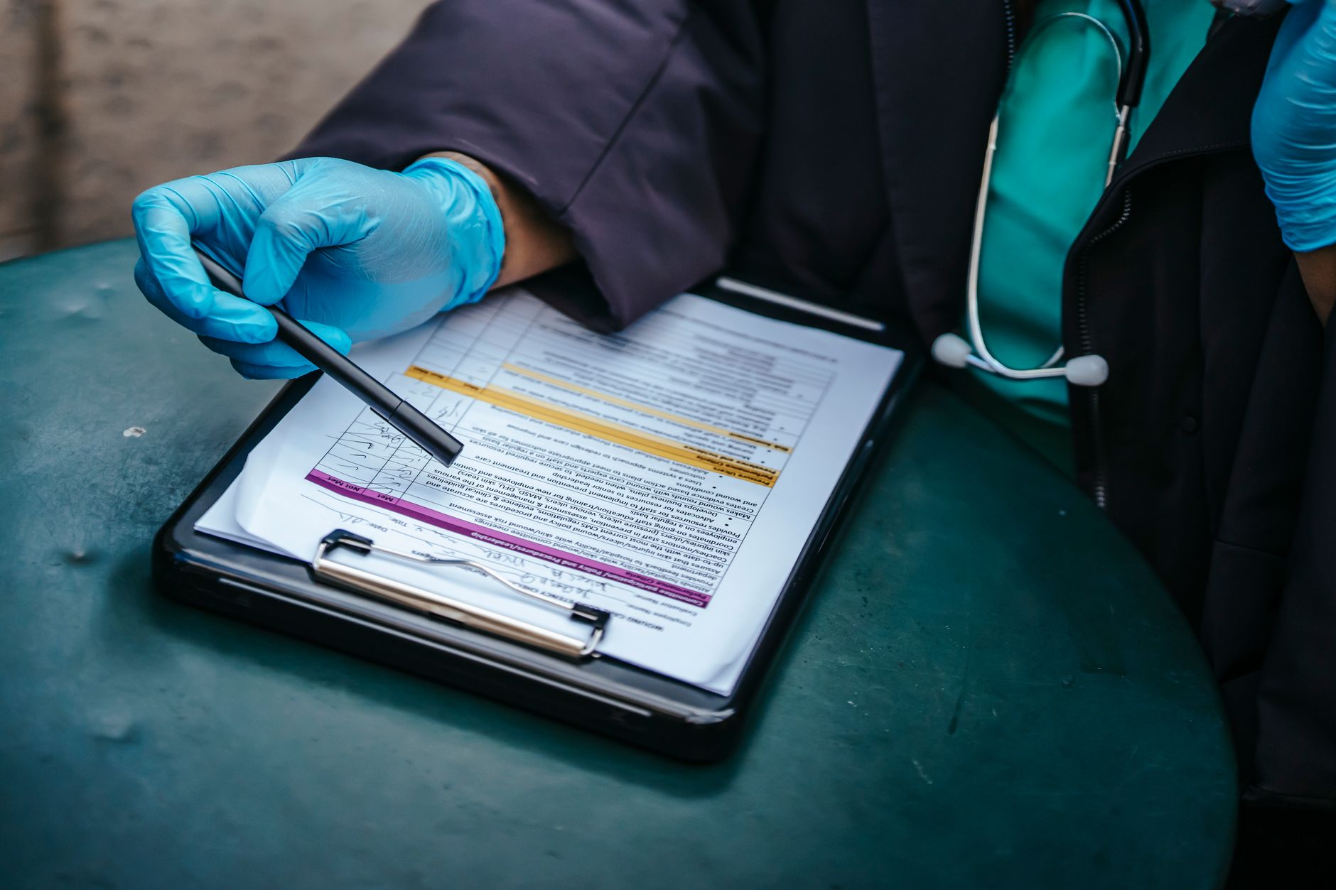 clinic desk USDA health certificate forms beside stethoscope dog