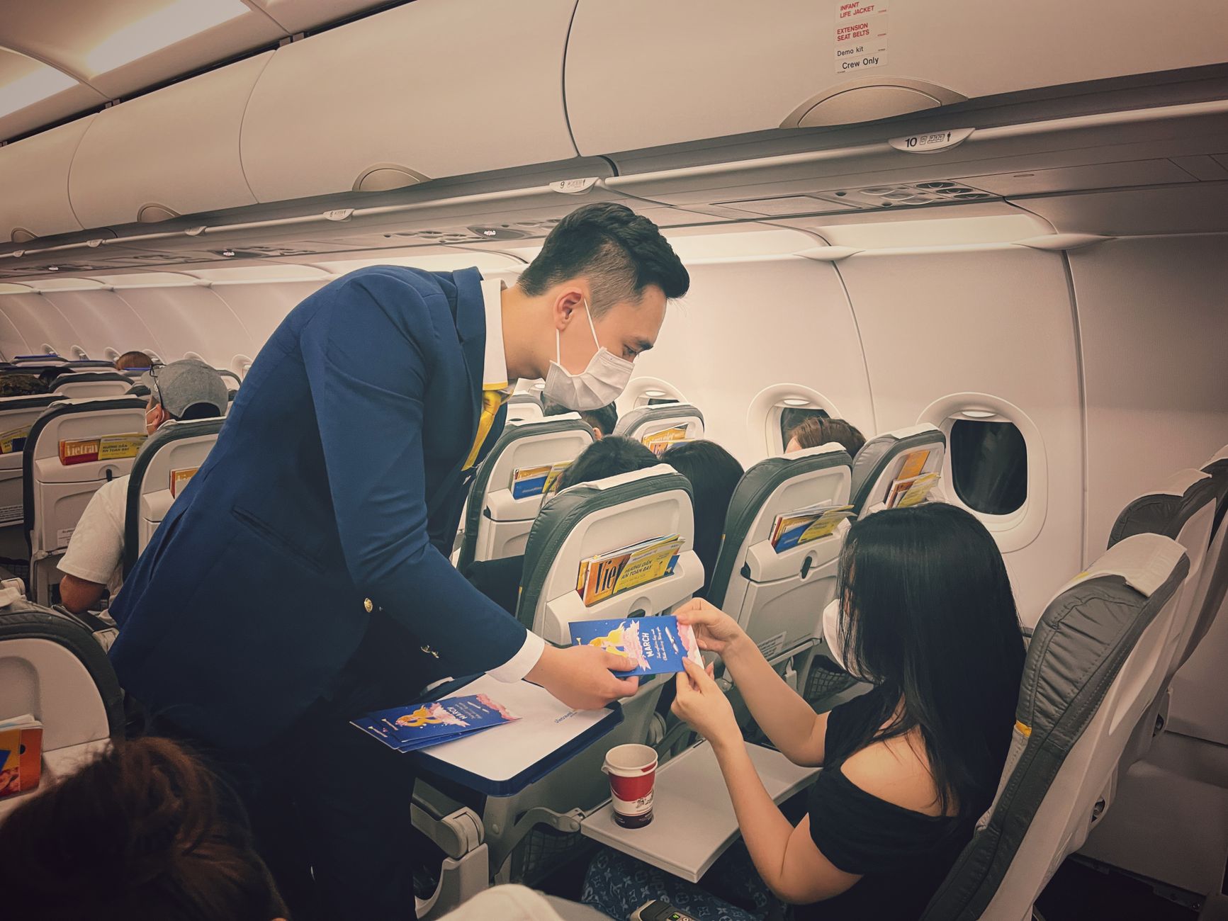 passenger boarding international flight with cat travel crate
