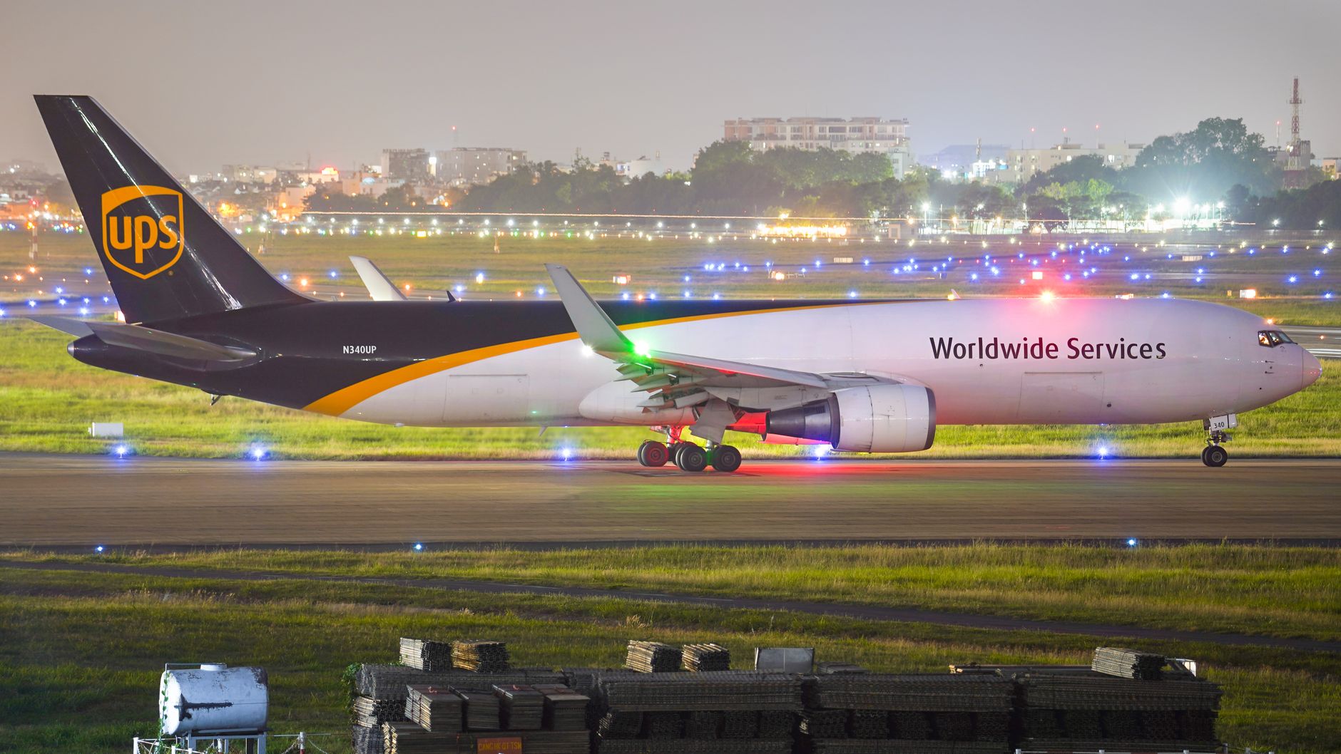 horse walking off cargo plane on airport tarmac