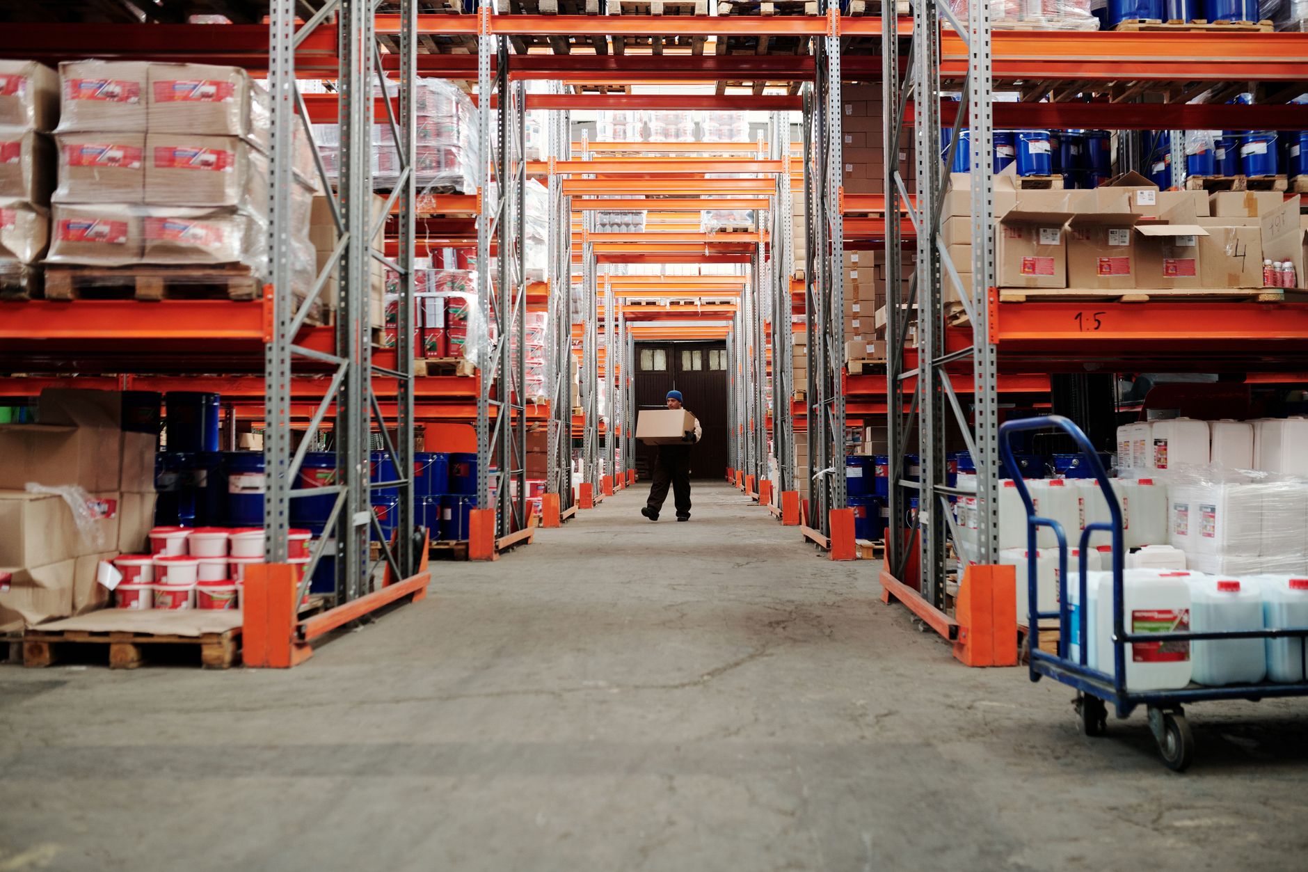 hard plastic airline pet kennel on cargo warehouse floor