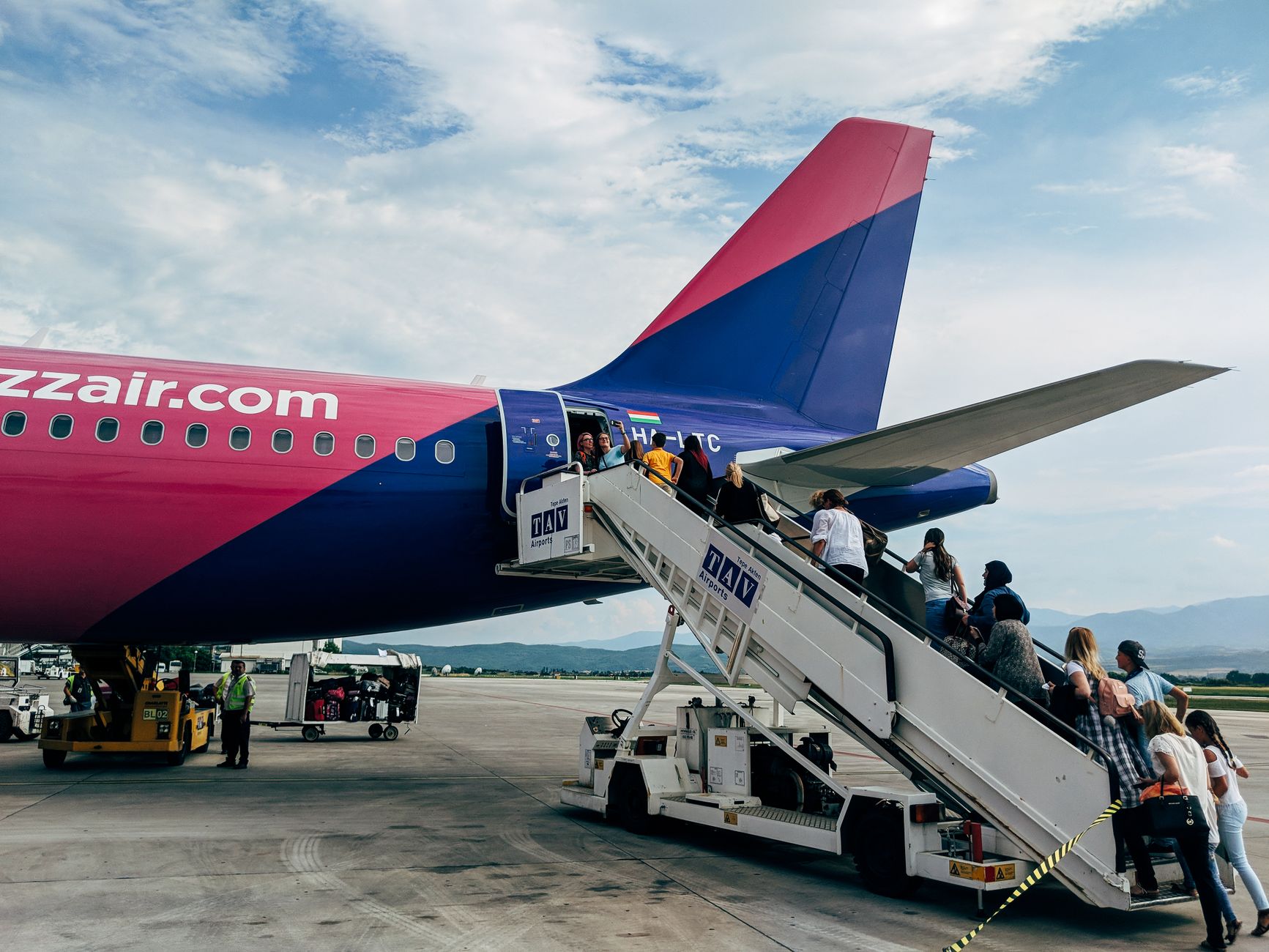 passenger with dog carrier airport